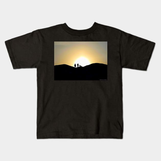 Silhouette of walkers  on the peak of mam tor derbyshire Kids T-Shirt by Simon-dell